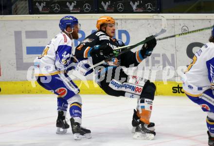 EBEL. Eishockey Bundesliga. VSV gegen Black Wings 1992.  Jamie Fraser,  (VSV), Brian Lebler (Linz). Villach, am 14.2.2021.
Foto: Kuess
www.qspictures.net
---
pressefotos, pressefotografie, kuess, qs, qspictures, sport, bild, bilder, bilddatenbank