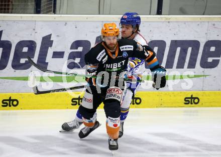 EBEL. Eishockey Bundesliga. VSV gegen Black Wings 1992.  Renars Krastenbergs, (VSV), Charles David Beaudoin  (Linz). Villach, am 14.2.2021.
Foto: Kuess
www.qspictures.net
---
pressefotos, pressefotografie, kuess, qs, qspictures, sport, bild, bilder, bilddatenbank