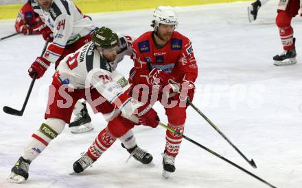 EBEL. Eishockey Bundesliga. KAC gegen	HCB Suedtirol Alperia. Thomas Hundertpfund,  (KAC), Dennis Robertson (Bozen). Klagenfurt, am 21.2.2021.
Foto: Kuess
www.qspictures.net

---
pressefotos, pressefotografie, kuess, qs, qspictures, sport, bild, bilder, bilddatenbank