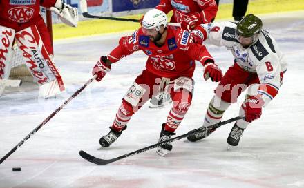 EBEL. Eishockey Bundesliga. KAC gegen	HCB Suedtirol Alperia. Steven Strong,  (KAC), Marco Insam (Bozen). Klagenfurt, am 21.2.2021.
Foto: Kuess
www.qspictures.net

---
pressefotos, pressefotografie, kuess, qs, qspictures, sport, bild, bilder, bilddatenbank