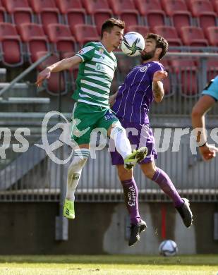 Fussball 2. Liga. SK Austria Klagenfurt gegen  SK Rapid II.  Kosmas Gkezos (Klagenfurt),  Dragoljub Savic (Rapid). Klagenfurt, am 21.2.2021.
Foto: Kuess
www.qspictures.net
---
pressefotos, pressefotografie, kuess, qs, qspictures, sport, bild, bilder, bilddatenbank