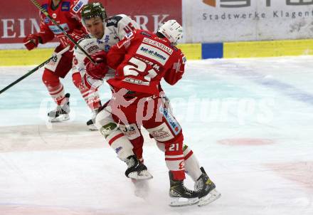 EBEL. Eishockey Bundesliga. KAC gegen	HCB Suedtirol Alperia. Manuel Geier,  (KAC), Ivan Deluca (Bozen). Klagenfurt, am 21.2.2021.
Foto: Kuess
www.qspictures.net

---
pressefotos, pressefotografie, kuess, qs, qspictures, sport, bild, bilder, bilddatenbank