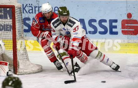 EBEL. Eishockey Bundesliga. KAC gegen	HCB Suedtirol Alperia. Rok Ticar,  (KAC), Luca Frigo (Bozen). Klagenfurt, am 21.2.2021.
Foto: Kuess
www.qspictures.net

---
pressefotos, pressefotografie, kuess, qs, qspictures, sport, bild, bilder, bilddatenbank
