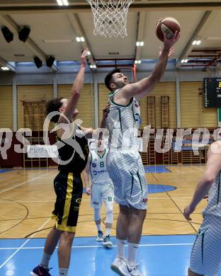 Basketball Zweite Liga 2020/2021. Grunddurchgang 20. Runde. KOS Celovec gegen  Fuerstenfeld Panthers. Marin Sliskovic (KOS Celovec), Lukas Hahn (Fuerstenfeld). Klagenfurt, am 20.2.2021.
Foto: Kuess
www.qspictures.net

---
pressefotos, pressefotografie, kuess, qs, qspictures, sport, bild, bilder, bilddatenbank
