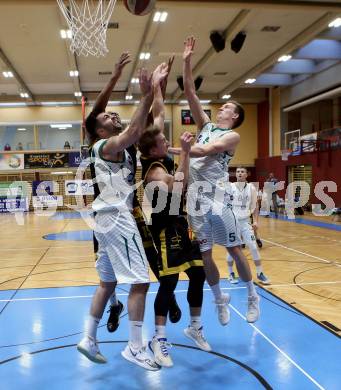Basketball Zweite Liga 2020/2021. Grunddurchgang 20. Runde. KOS Celovec gegen  Fuerstenfeld Panthers. Marin Sliskovic, Andi Smrtnik (KOS Celovec), Georg Wolf,  David A. O. Akibo (Fuerstenfeld). Klagenfurt, am 20.2.2021.
Foto: Kuess
www.qspictures.net

---
pressefotos, pressefotografie, kuess, qs, qspictures, sport, bild, bilder, bilddatenbank