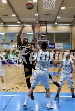 Basketball Zweite Liga 2020/2021. Grunddurchgang 20. Runde. KOS Celovec gegen  Fuerstenfeld Panthers. Marin Sliskovic (KOS Celovec), David A. O. Akibo (Fuerstenfeld). Klagenfurt, am 20.2.2021.
Foto: Kuess
www.qspictures.net

---
pressefotos, pressefotografie, kuess, qs, qspictures, sport, bild, bilder, bilddatenbank