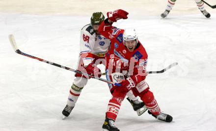 EBEL. Eishockey Bundesliga. KAC gegen	HCB Suedtirol Alperia. Nicholas Eric Petersen,  (KAC), Domenico Alberga (Bozen). Klagenfurt, am 21.2.2021.
Foto: Kuess
www.qspictures.net

---
pressefotos, pressefotografie, kuess, qs, qspictures, sport, bild, bilder, bilddatenbank