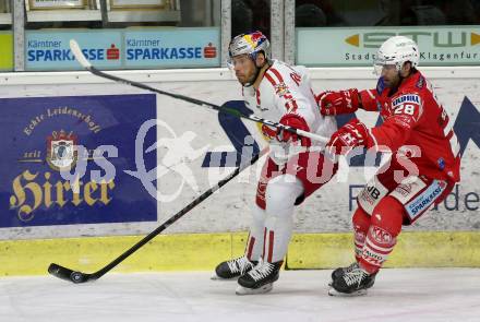EBEL. Eishockey Bundesliga. KAC gegen	EC Salzburg. Martin Schumnig,  (KAC),  Thomas Raffl (Salzburg). Klagenfurt, am 26.2.2021.
Foto: Kuess
www.qspictures.net

---
pressefotos, pressefotografie, kuess, qs, qspictures, sport, bild, bilder, bilddatenbank