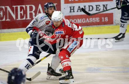 EBEL. Eishockey Bundesliga. KAC gegen	Fehervar AV19. Manuel Geier,  (KAC), Janos Hari  (Fehervar). Klagenfurt, am 7.3.2021.
Foto: Kuess
www.qspictures.net

---
pressefotos, pressefotografie, kuess, qs, qspictures, sport, bild, bilder, bilddatenbank