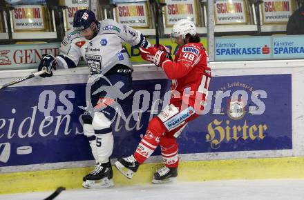 EBEL. Eishockey Bundesliga. KAC gegen	Fehervar AV19. Samuel Witting,  (KAC),  Bence Stipsicz (Fehervar). Klagenfurt, am 7.3.2021.
Foto: Kuess
www.qspictures.net

---
pressefotos, pressefotografie, kuess, qs, qspictures, sport, bild, bilder, bilddatenbank