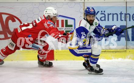 EBEL. Eishockey Bundesliga. KAC gegen	VSV. Manuel Geier,  (KAC),  Sahir Gill (VSV). Klagenfurt, am 12.3.2021.
Foto: Kuess
www.qspictures.net

---
pressefotos, pressefotografie, kuess, qs, qspictures, sport, bild, bilder, bilddatenbank