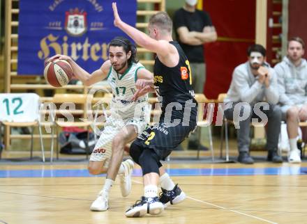 Basketball Zweite Liga 2020/2021. Grunddurchgang 22. Runde. KOS Celovec gegen  Guessing/Jennersdorf Blackbirds.  Volkan Oezdemir,  (KOS Celovec),  Mate Horvath (Blackbirds). Klagenfurt, am 13.3.2021.
Foto: Kuess
www.qspictures.net

---
pressefotos, pressefotografie, kuess, qs, qspictures, sport, bild, bilder, bilddatenbank