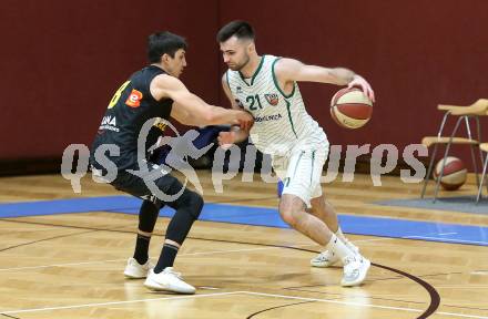 Basketball Zweite Liga 2020/2021. Grunddurchgang 22. Runde. KOS Celovec gegen  Guessing/Jennersdorf Blackbirds. Marin Sliskovic,  (KOS Celovec),  Bernhard Koch (Blackbirds). Klagenfurt, am 13.3.2021.
Foto: Kuess
www.qspictures.net

---
pressefotos, pressefotografie, kuess, qs, qspictures, sport, bild, bilder, bilddatenbank