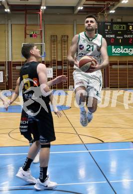Basketball Zweite Liga 2020/2021. Grunddurchgang 22. Runde. KOS Celovec gegen  Guessing/Jennersdorf Blackbirds. Marin Sliskovic,  (KOS Celovec),  Sebastian Koch (Blackbirds). Klagenfurt, am 13.3.2021.
Foto: Kuess
www.qspictures.net

---
pressefotos, pressefotografie, kuess, qs, qspictures, sport, bild, bilder, bilddatenbank