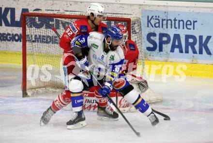 EBEL. Eishockey Bundesliga. KAC gegen	VSV. Clemens Unterweger,  (KAC),  Jerry Pollastrone (VSV). Klagenfurt, am 21.3.2021.
Foto: Kuess
www.qspictures.net

---
pressefotos, pressefotografie, kuess, qs, qspictures, sport, bild, bilder, bilddatenbank