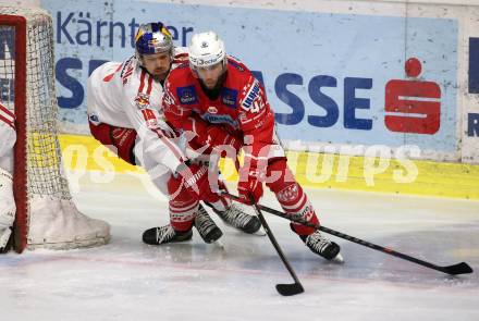 EBEL. Eishockey Bundesliga. KAC gegen	EC Red Bull Salzburg. Rok Ticar,  (KAC), Rick Schofield  (Salzburg). Klagenfurt, am 28.3.2021.
Foto: Kuess
www.qspictures.net

---
pressefotos, pressefotografie, kuess, qs, qspictures, sport, bild, bilder, bilddatenbank