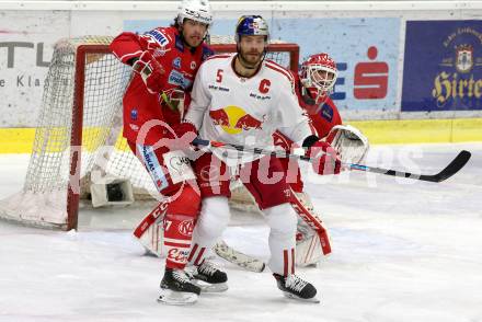 EBEL. Eishockey Bundesliga. KAC gegen	EC Red Bull Salzburg. Thomas Hundertpfund, (KAC), Thomas Raffl   (Salzburg). Klagenfurt, am 28.3.2021.
Foto: Kuess
www.qspictures.net

---
pressefotos, pressefotografie, kuess, qs, qspictures, sport, bild, bilder, bilddatenbank