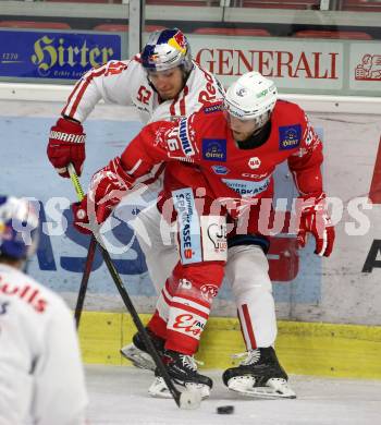 EBEL. Eishockey Bundesliga. KAC gegen	EC Red Bull Salzburg. Johannes Bischofberger,  (KAC),  Paul Huber (Salzburg). Klagenfurt, am 28.3.2021.
Foto: Kuess
www.qspictures.net

---
pressefotos, pressefotografie, kuess, qs, qspictures, sport, bild, bilder, bilddatenbank
