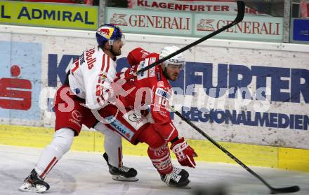 EBEL. Eishockey Bundesliga. KAC gegen	EC Red Bull Salzburg. Thomas Vallant,  (KAC), David McIntyre  (Salzburg). Klagenfurt, am 28.3.2021.
Foto: Kuess
www.qspictures.net

---
pressefotos, pressefotografie, kuess, qs, qspictures, sport, bild, bilder, bilddatenbank