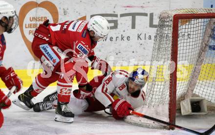 EBEL. Eishockey Bundesliga. KAC gegen	EC Red Bull Salzburg. Manuel Geier,  (KAC), Rick Schofield  (Salzburg). Klagenfurt, am 1.4.2021.
Foto: Kuess
www.qspictures.net

---
pressefotos, pressefotografie, kuess, qs, qspictures, sport, bild, bilder, bilddatenbank