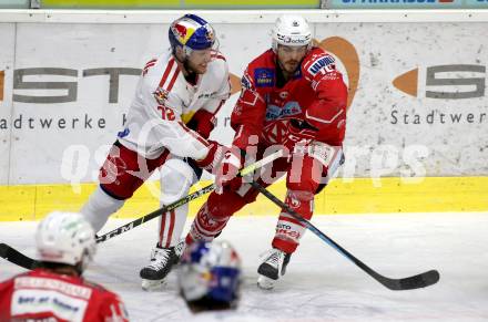 EBEL. Eishockey Bundesliga. KAC gegen	EC Red Bull Salzburg. Thomas Vallant, (KAC), John Hughes   (Salzburg). Klagenfurt, am 1.4.2021.
Foto: Kuess
www.qspictures.net

---
pressefotos, pressefotografie, kuess, qs, qspictures, sport, bild, bilder, bilddatenbank