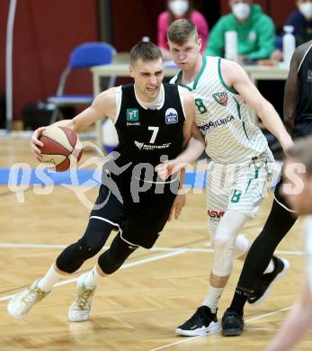 Basketball Zweite Liga 2020/2021. Playoffs. VF2. KOS Celovec gegen  Raiders Tirol. Jernej Heine Andolsek (KOS Celovec), Rene Gradolnik (Tirol). Klagenfurt, am 3.4.2021.
Foto: Kuess
www.qspictures.net

---
pressefotos, pressefotografie, kuess, qs, qspictures, sport, bild, bilder, bilddatenbank