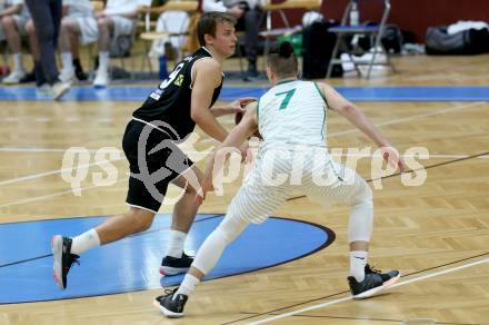Basketball Zweite Liga 2020/2021. Playoffs. VF2. KOS Celovec gegen  Raiders Tirol. Anze Kos (KOS Celovec), Elvis Keric (Tirol). Klagenfurt, am 3.4.2021.
Foto: Kuess
www.qspictures.net

---
pressefotos, pressefotografie, kuess, qs, qspictures, sport, bild, bilder, bilddatenbank