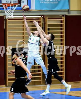 Basketball Zweite Liga 2020/2021. Playoffs. VF2. KOS Celovec gegen  Raiders Tirol. Anze Kos (KOS Celovec), Rene Gradolnik (Tirol). Klagenfurt, am 3.4.2021.
Foto: Kuess
www.qspictures.net

---
pressefotos, pressefotografie, kuess, qs, qspictures, sport, bild, bilder, bilddatenbank