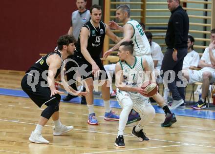 Basketball Zweite Liga 2020/2021. Playoffs. VF2. KOS Celovec gegen  Raiders Tirol. Anze Kos (KOS Celovec), Timur Bas (Tirol). Klagenfurt, am 3.4.2021.
Foto: Kuess
www.qspictures.net

---
pressefotos, pressefotografie, kuess, qs, qspictures, sport, bild, bilder, bilddatenbank