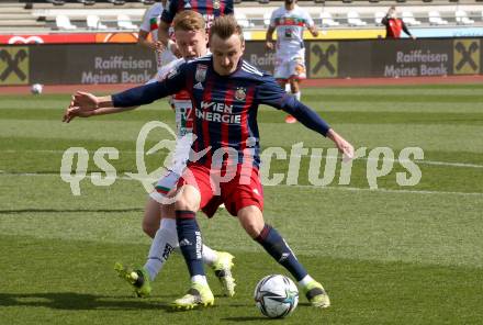 Fussball. Bundesliga. RZ Pellets WAC gegen SK Rapid. Kai Lukas Stratznig,  (WAC), Marcel Ritzmaier (Rapid). Wolfsberg, am 4.4.2021.
Foto: Kuess
www.qspictures.net

---
pressefotos, pressefotografie, kuess, qs, qspictures, sport, bild, bilder, bilddatenbank