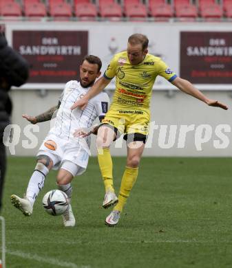 Fussball 2. Liga. SK Austria Klagenfurt gegen  SV Lafnitz. Philipp Huetter, (Klagenfurt),  Mario Kroepfl   (Lafnitz). Klagenfurt, am 5.4.2021.
Foto: Kuess
www.qspictures.net
---
pressefotos, pressefotografie, kuess, qs, qspictures, sport, bild, bilder, bilddatenbank
