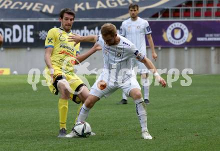 Fussball 2. Liga. SK Austria Klagenfurt gegen  SV Lafnitz. Markus Rusek,  (Klagenfurt),  Philipp Wendler  (Lafnitz). Klagenfurt, am 5.4.2021.
Foto: Kuess
www.qspictures.net
---
pressefotos, pressefotografie, kuess, qs, qspictures, sport, bild, bilder, bilddatenbank