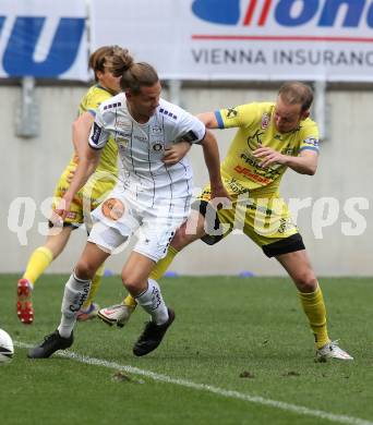 Fussball 2. Liga. SK Austria Klagenfurt gegen  SV Lafnitz. Patrick Greil, (Klagenfurt),  Mario Kroepfl   (Lafnitz). Klagenfurt, am 5.4.2021.
Foto: Kuess
www.qspictures.net
---
pressefotos, pressefotografie, kuess, qs, qspictures, sport, bild, bilder, bilddatenbank