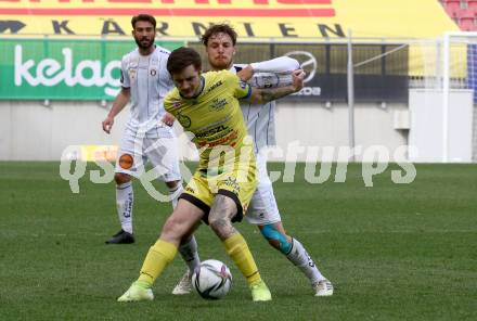 Fussball 2. Liga. SK Austria Klagenfurt gegen  SV Lafnitz. Simon Straudi, (Klagenfurt),  Martin Krienzer   (Lafnitz). Klagenfurt, am 5.4.2021.
Foto: Kuess
www.qspictures.net
---
pressefotos, pressefotografie, kuess, qs, qspictures, sport, bild, bilder, bilddatenbank