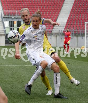 Fussball 2. Liga. SK Austria Klagenfurt gegen  SV Lafnitz. Patrick Greil,  (Klagenfurt),  Georg Grasser  (Lafnitz). Klagenfurt, am 5.4.2021.
Foto: Kuess
www.qspictures.net
---
pressefotos, pressefotografie, kuess, qs, qspictures, sport, bild, bilder, bilddatenbank