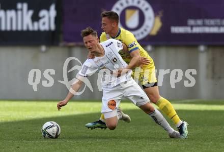 Fussball 2. Liga. SK Austria Klagenfurt gegen  SV Lafnitz. Fabian Miesenboeck,  (Klagenfurt),  Tobias Koch  (Lafnitz). Klagenfurt, am 5.4.2021.
Foto: Kuess
www.qspictures.net
---
pressefotos, pressefotografie, kuess, qs, qspictures, sport, bild, bilder, bilddatenbank