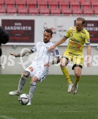 Fussball 2. Liga. SK Austria Klagenfurt gegen  SV Lafnitz. Philipp Huetter, (Klagenfurt),  Mario Kroepfl   (Lafnitz). Klagenfurt, am 5.4.2021.
Foto: Kuess
www.qspictures.net
---
pressefotos, pressefotografie, kuess, qs, qspictures, sport, bild, bilder, bilddatenbank
