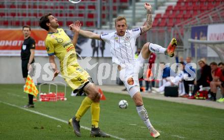 Fussball 2. Liga. SK Austria Klagenfurt gegen  SV Lafnitz. Florian Jaritz,  (Klagenfurt),   Philipp Wendler (Lafnitz). Klagenfurt, am 5.4.2021.
Foto: Kuess
www.qspictures.net
---
pressefotos, pressefotografie, kuess, qs, qspictures, sport, bild, bilder, bilddatenbank