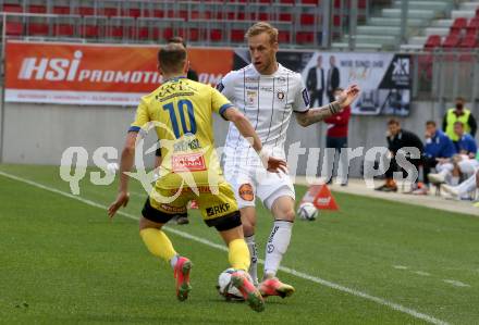 Fussball 2. Liga. SK Austria Klagenfurt gegen  SV Lafnitz. Florian Jaritz,  (Klagenfurt),  Daniel Gremsl  (Lafnitz). Klagenfurt, am 5.4.2021.
Foto: Kuess
www.qspictures.net
---
pressefotos, pressefotografie, kuess, qs, qspictures, sport, bild, bilder, bilddatenbank