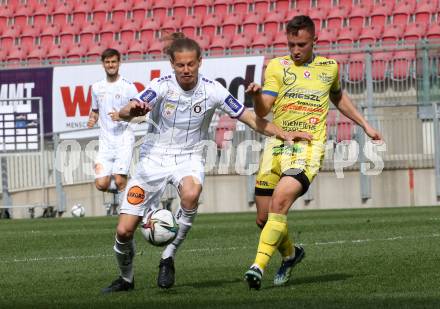Fussball 2. Liga. SK Austria Klagenfurt gegen  SV Lafnitz. Patrick Greil,  (Klagenfurt),  Tobias Koch  (Lafnitz). Klagenfurt, am 5.4.2021.
Foto: Kuess
www.qspictures.net
---
pressefotos, pressefotografie, kuess, qs, qspictures, sport, bild, bilder, bilddatenbank