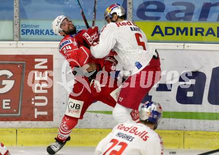 EBEL. Eishockey Bundesliga. KAC gegen	EC Red Bull Salzburg. Steven Strong, (KAC),  Thomas Raffl  (Salzburg). Klagenfurt, am 5.4.2021.
Foto: Kuess
www.qspictures.net

---
pressefotos, pressefotografie, kuess, qs, qspictures, sport, bild, bilder, bilddatenbank
