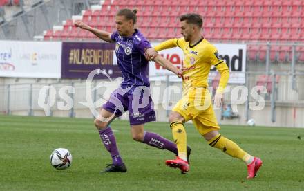 Fussball 2. Liga. SK Austria Klagenfurt gegen  Kapfenberger SV. Patrick Greil,  (Klagenfurt),  Elvedin Heric  (Kapfenberger SV). Klagenfurt, am 9.4.2021.
Foto: Kuess
www.qspictures.net
---
pressefotos, pressefotografie, kuess, qs, qspictures, sport, bild, bilder, bilddatenbank