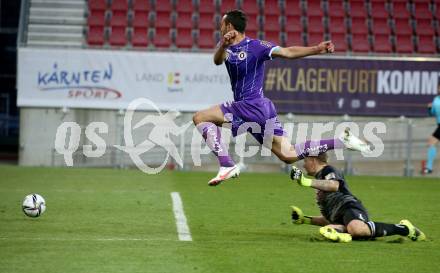 Fussball 2. Liga. SK Austria Klagenfurt gegen  Kapfenberger SV. Markus Pink,  (Klagenfurt),  Christopher Giuliani  (Kapfenberger SV). Klagenfurt, am 9.4.2021.
Foto: Kuess
www.qspictures.net
---
pressefotos, pressefotografie, kuess, qs, qspictures, sport, bild, bilder, bilddatenbank