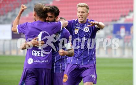 Fussball 2. Liga. SK Austria Klagenfurt gegen  Kapfenberger SV. Torjubel Patrick Greil,  Kosmas Gkezos, Christopher Cvetko  (Klagenfurt). Klagenfurt, am 9.4.2021.
Foto: Kuess
www.qspictures.net
---
pressefotos, pressefotografie, kuess, qs, qspictures, sport, bild, bilder, bilddatenbank