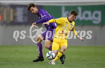 Fussball 2. Liga. SK Austria Klagenfurt gegen  Kapfenberger SV. Thorsten Mahrer, (Klagenfurt), Lukas Parger    (Kapfenberger SV). Klagenfurt, am 9.4.2021.
Foto: Kuess
www.qspictures.net
---
pressefotos, pressefotografie, kuess, qs, qspictures, sport, bild, bilder, bilddatenbank