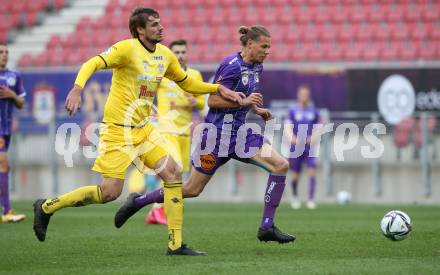 Fussball 2. Liga. SK Austria Klagenfurt gegen  Kapfenberger SV. Patrick Greil,  (Klagenfurt),  Mario Cetina  (Kapfenberger SV). Klagenfurt, am 9.4.2021.
Foto: Kuess
www.qspictures.net
---
pressefotos, pressefotografie, kuess, qs, qspictures, sport, bild, bilder, bilddatenbank