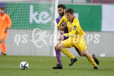 Fussball 2. Liga. SK Austria Klagenfurt gegen  Kapfenberger SV. Kosmas Gkezos,  (Klagenfurt), Marvin Hernaus   (Kapfenberger SV). Klagenfurt, am 9.4.2021.
Foto: Kuess
www.qspictures.net
---
pressefotos, pressefotografie, kuess, qs, qspictures, sport, bild, bilder, bilddatenbank