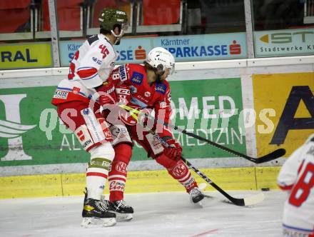 EBEL. Eishockey Bundesliga. KAC gegen	HCB Suedtirol Alperia. Obersteiner Daniel (KAC),  Deluca Ivan (Bozen). Klagenfurt, am 13.4.2021.
Foto: Kuess
www.qspictures.net

---
pressefotos, pressefotografie, kuess, qs, qspictures, sport, bild, bilder, bilddatenbank