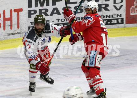 EBEL. Eishockey Bundesliga. KAC gegen	HCB Suedtirol Alperia. Thomas Koch,  (KAC),  Daniel Catenacci (Bozen). Klagenfurt, am 18.4.2021.
Foto: Kuess
www.qspictures.net

---
pressefotos, pressefotografie, kuess, qs, qspictures, sport, bild, bilder, bilddatenbank