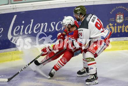 EBEL. Eishockey Bundesliga. KAC gegen	HCB Suedtirol Alperia. Michael Kernberger,  (KAC),  Michael Halmo (Bozen). Klagenfurt, am 18.4.2021.
Foto: Kuess
www.qspictures.net

---
pressefotos, pressefotografie, kuess, qs, qspictures, sport, bild, bilder, bilddatenbank